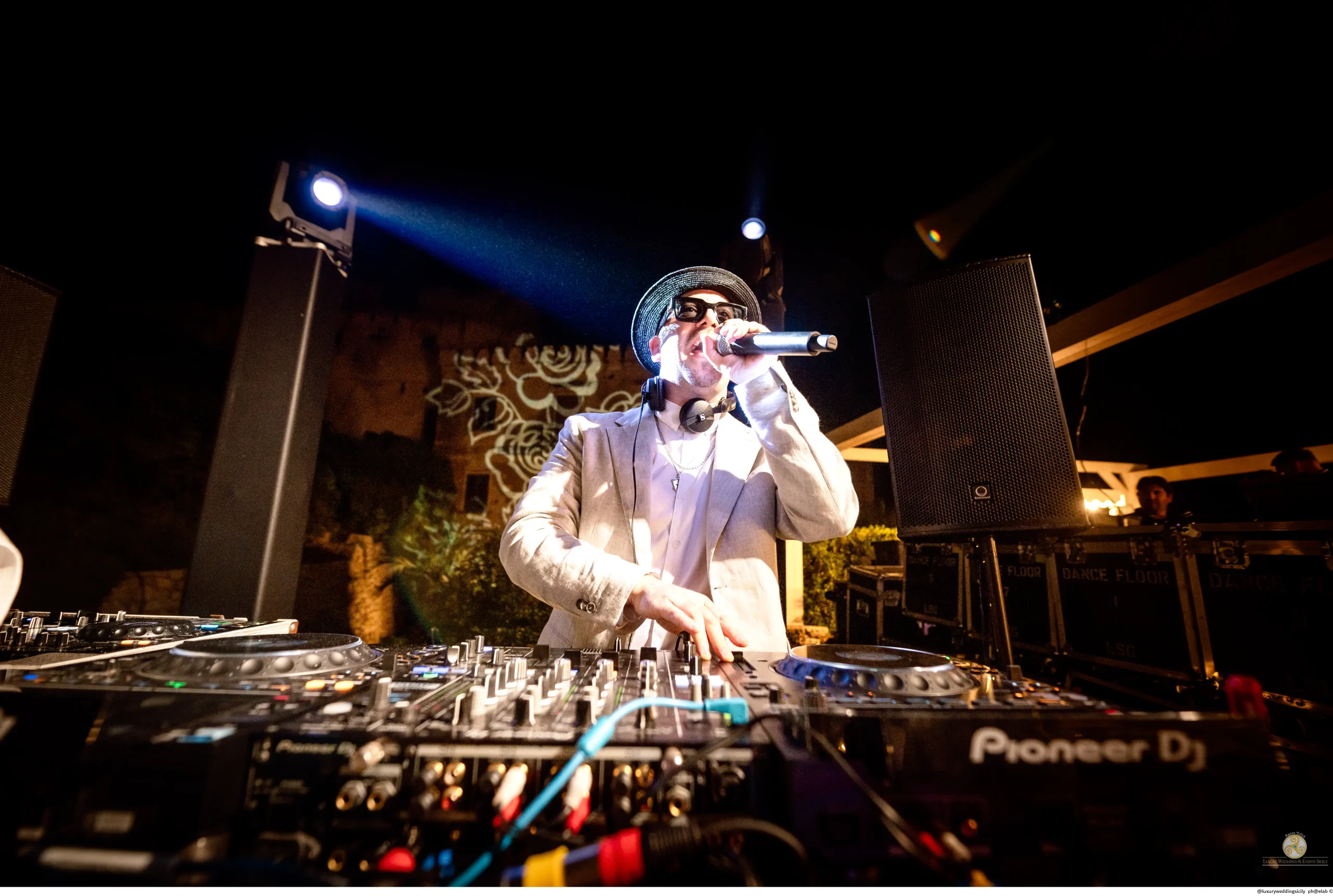 Portfolio 415 Luxury DJ set for VIP events in Sicily, American DJ for luxury events in Italy, Sinatra-themed DJ set in Sicily, VIP event DJ services in Italy, Exclusive DJ set for VIP parties in Sicily, American DJ for luxury events in Sicily, DJ set with Sinatra classics for VIP events, Luxury DJ set in Italy with Sinatra music, High-end DJ services for Sicily VIP events, American DJ for exclusive events in Italy, Sicily DJ set for luxury VIP events, Italian DJ for Sinatra-themed VIP events, VIP event DJ specializing in Sinatra music, Sicily luxury DJ with Sinatra-style playlist, Hire American DJ for Italy luxury events, DJ set in Sicily for luxury American-themed events, Sinatra music DJ for high-end events in Italy, Sicily VIP event DJ with Sinatra vibes, American DJ for exclusive VIP events in Sicily, Sinatra-inspired luxury DJ set in Italy, Sicily high-profile events with American DJ, VIP Sinatra-style DJ set in Sicily, Luxury VIP DJ event in Italy with Sinatra music, DJ set for VIP events in Sicily featuring Sinatra, American DJ services for luxury events in Sicily, Italy’s best DJ set for VIP events with Sinatra music, Exclusive DJ set in Sicily with Sinatra theme, Hire luxury DJ for VIP events in Italy, American DJ for Sinatra-inspired events in Sicily, Luxury American DJ services for Sicily events, High-profile VIP DJ set in Italy with Sinatra songs, DJ set for VIP events Italy featuring Sinatra classics, American DJ with Sinatra playlist for Italy events, Italy luxury DJ set for American VIP events, Exclusive Sinatra DJ set for VIP parties in Sicily, DJ for luxury Sinatra-themed events in Italy, Book DJ set in Sicily with Sinatra vibes, VIP DJ with Sinatra-style music in Sicily, American DJ services for high-end Sicily events, Italy VIP event DJ with Sinatra-inspired playlist, Luxury DJ set with Sinatra theme in Sicily