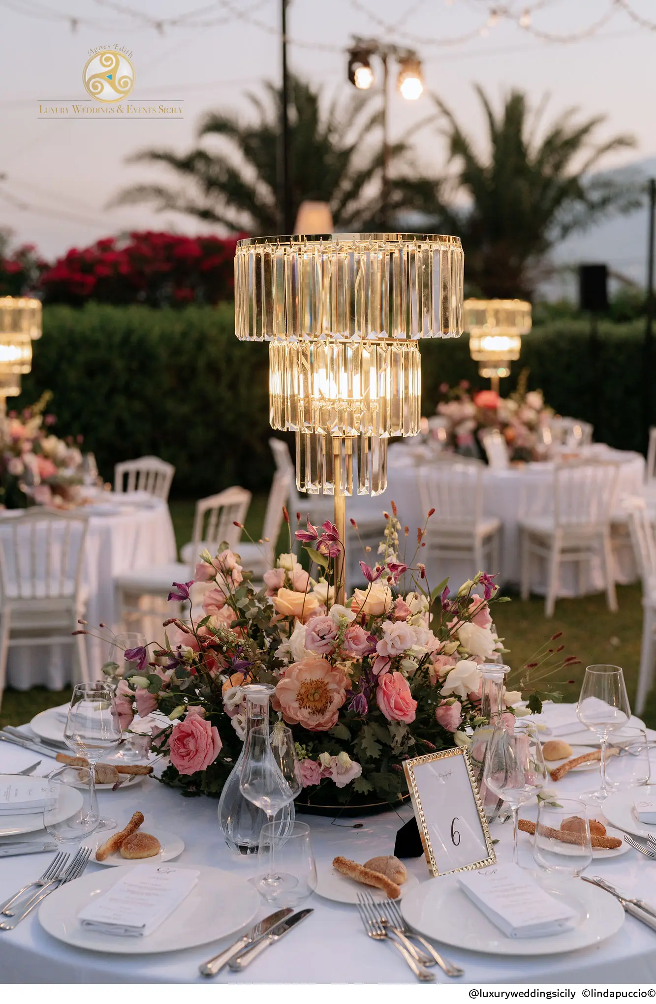 Portfolio 365 wedding design reception with Etna view and sea backdrop in Sicily, elegant wedding setting with flowers and pastel decor in Sicily, wedding reception tables with light lamps and flower decorations in Sicily, garden wedding reception design with piano music, flowers, and Etna view in Sicily, chic wedding reception decor with Etna view, flowers, and pastel colors in Sicily, elegant wedding reception with piano, flowers, and Etna view in Sicily, wedding reception tables with flowers and elegant lighting in Taormina, Sicily, wedding reception with garden, Etna view, and chic pastel decor in Sicily, elegant wedding reception design with flowers, lamps, and Etna backdrop in Sicily, white and pastel wedding reception tables with flowers and Etna view in Taormina, chic garden wedding reception with piano music and floral decor in Sicily, Sicily wedding reception design with light lamps, flowers, and Etna view, wedding tables in pastel colors with flowers and Etna view in Taormina, elegant wedding reception with floral decoration and Etna view in Sicily, wedding reception design with piano music, Etna view, and flowers in Sicily, chic wedding setting with flowers and Etna view in Taormina, Sicily, wedding reception with garden design, flowers, and Etna view in Sicily, beautiful wedding reception tables with flowers and Etna backdrop in Sicily, white and pastel wedding reception with piano music and garden decor in Sicily, wedding reception tables with elegant light lamps and flower decorations in Taormina, garden wedding reception design with flowers, lamps, and Etna view in Sicily, pastel wedding reception with flowers, lights, and piano in Taormina, reception wedding tables with flowers and piano music in Sicily, Etna view, elegant reception design with flowers and Etna view in Sicily, wedding tables decorated with pastel flowers and light lamps in Sicily, wedding reception with elegant design and Etna view in Sicily, beautiful wedding decor with Etna view, flowers, and piano in Taormina, chic wedding reception with flowers, lamps, and Etna view in Sicily, wedding reception design with Etna backdrop, flowers, and chic lighting in Sicily, reception tables with flower decor and Etna view in Sicily, wedding reception design with piano music, flowers, and Etna view in Taormina, elegant wedding reception with flowers, light lamps, and Etna view in Sicily, wedding reception tables with flowers, lamps, and Etna view in Taormina, elegant wedding decor with Etna view, flowers, and pastel colors in Sicily, chic wedding setting with flowers, light lamps, and Etna view in Sicily, wedding reception with piano music, flowers, and Etna view in Sicily, white wedding reception design with flowers, lamps, and Etna backdrop in Sicily, garden wedding reception with pastel decor and Etna view in Taormina, elegant wedding reception with chic flower arrangements and Etna view in Sicily.